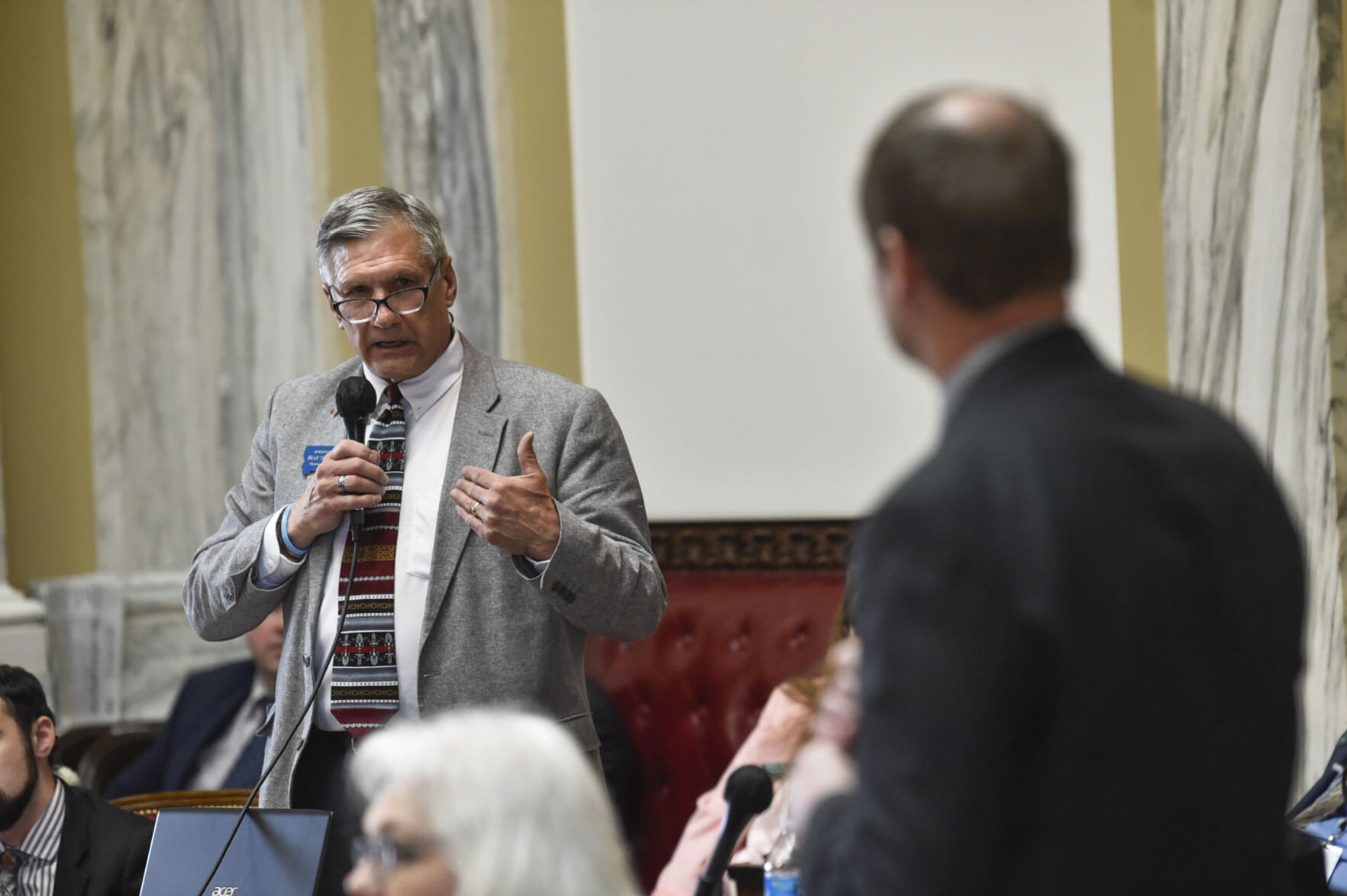 Rep. Brad Tschida, R-Missoula, ask a question of Rep. Matt Regier, R-Kalispell,
